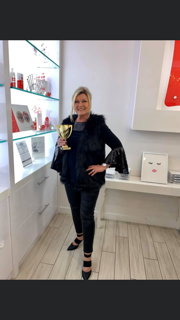 woman in front of product display