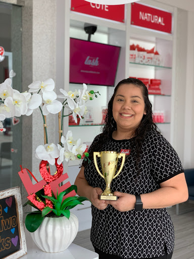 woman holding trophy
